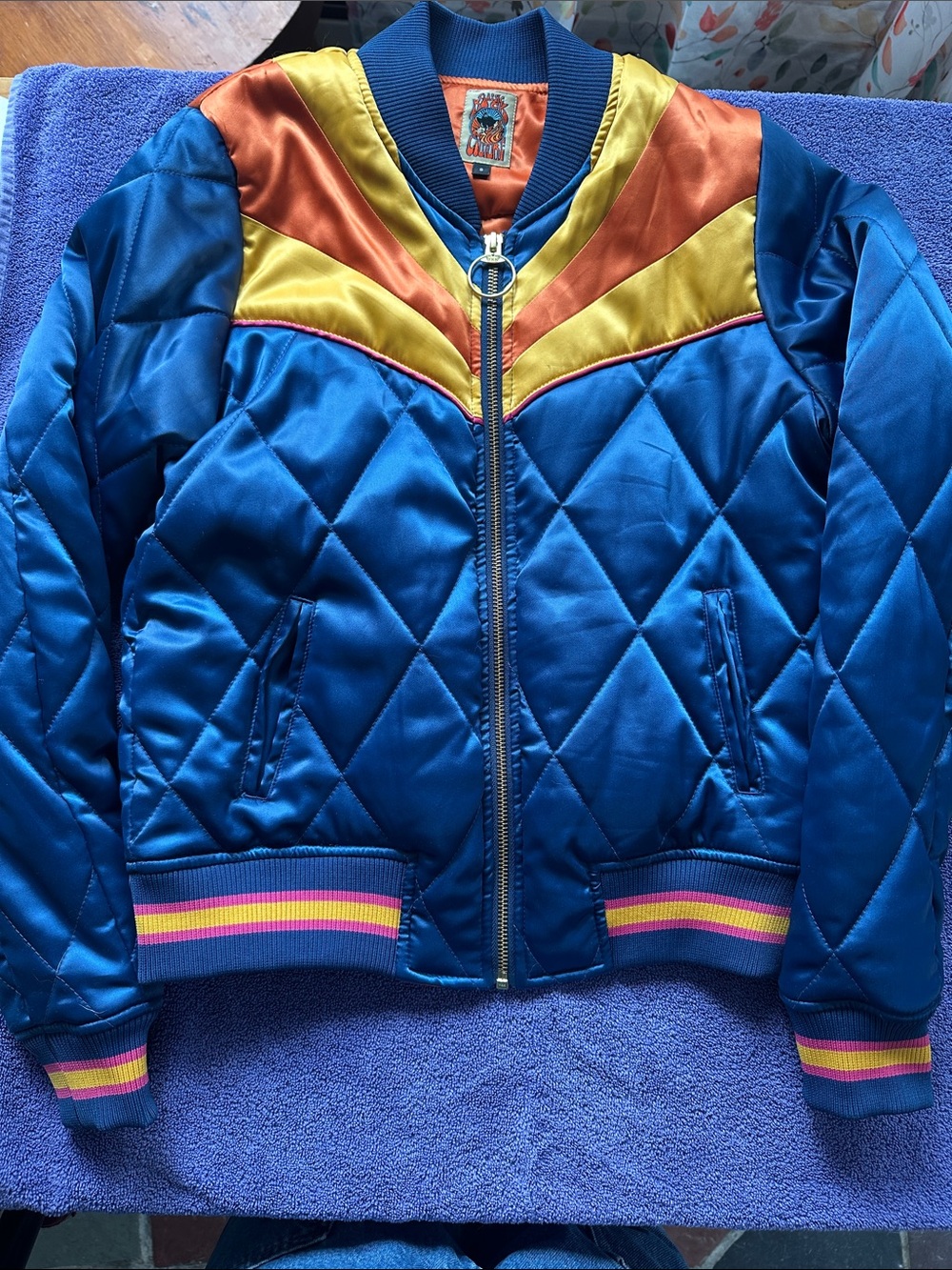 Blue Quilted Satin Bomber Jacket with Yellow & Orange Accents